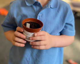 Child with plant pot 2
